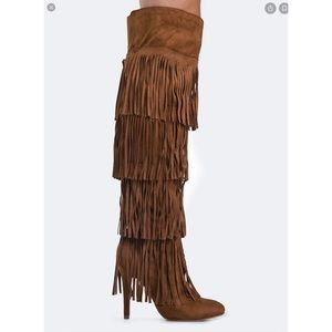 Over the knee fringe boots